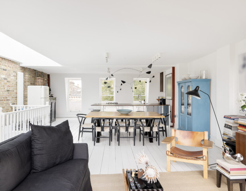Bright open-plan kitchen, dining and reception room with a skylight, in a duplex apartment for sale