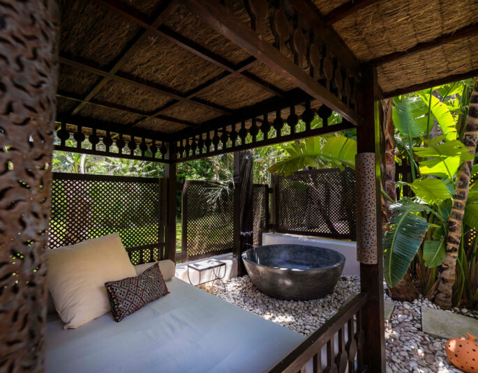 A day bed and outdoor bath