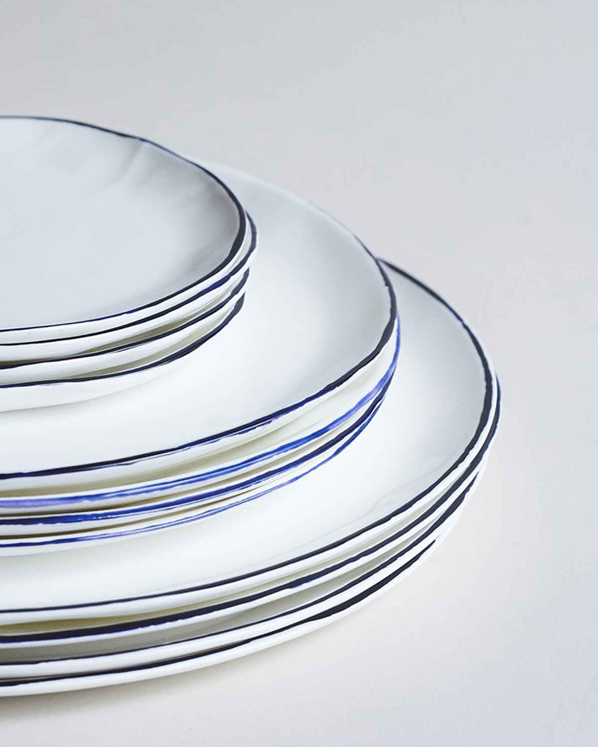 Plate edges by Feldspar - artisinal ceramics handmade in the UK