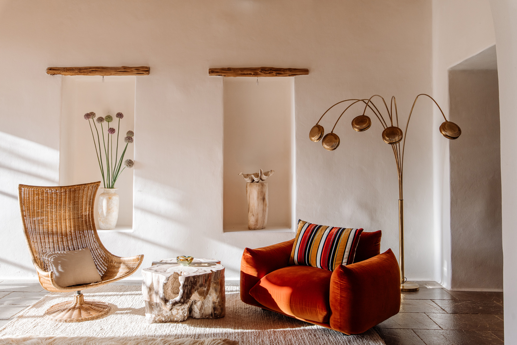 Sun-dappled interior of a luxury rental villa in Ibiza