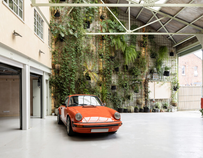 Bright triple-height courtyard of a duplex apartment for sale