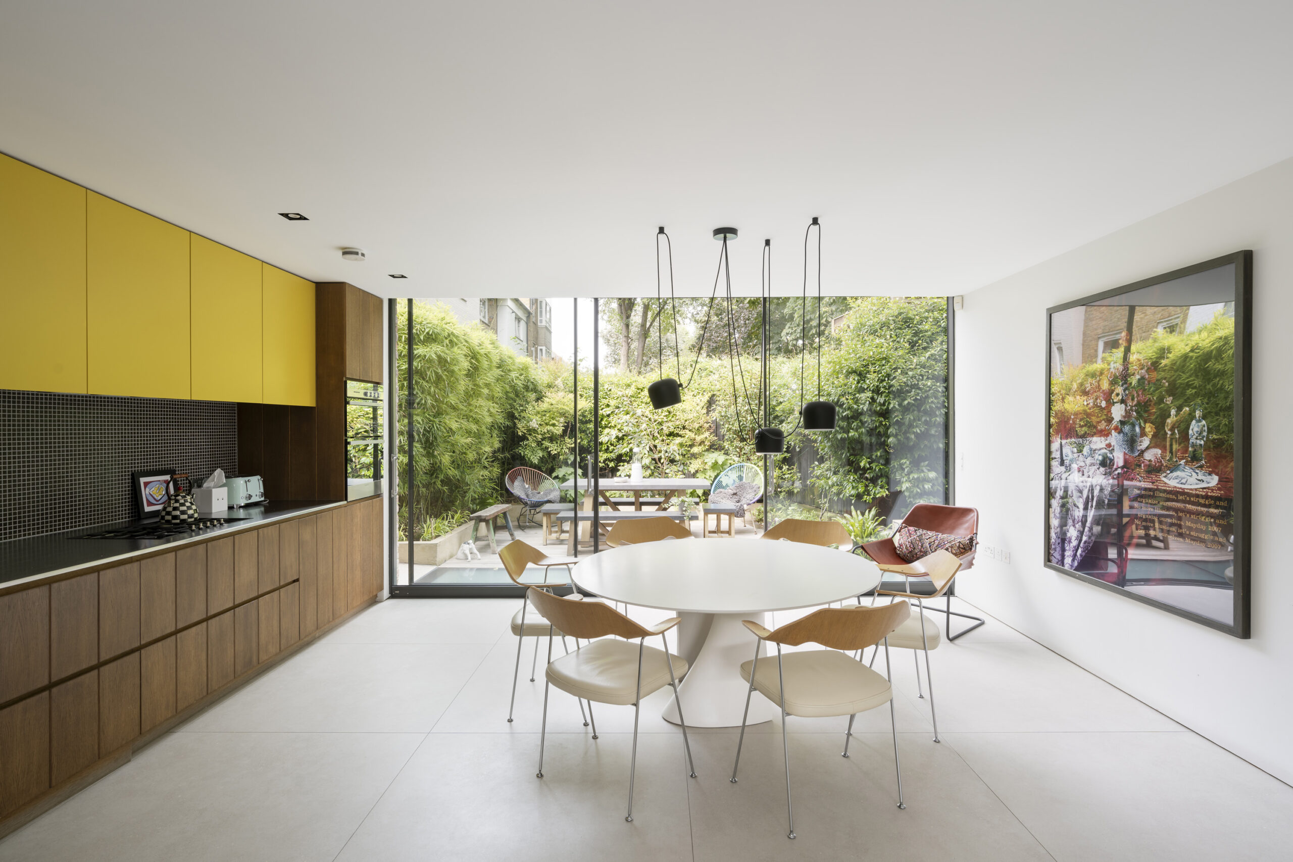 Open plan kitchen of architect designed house for sale in Holland Park.