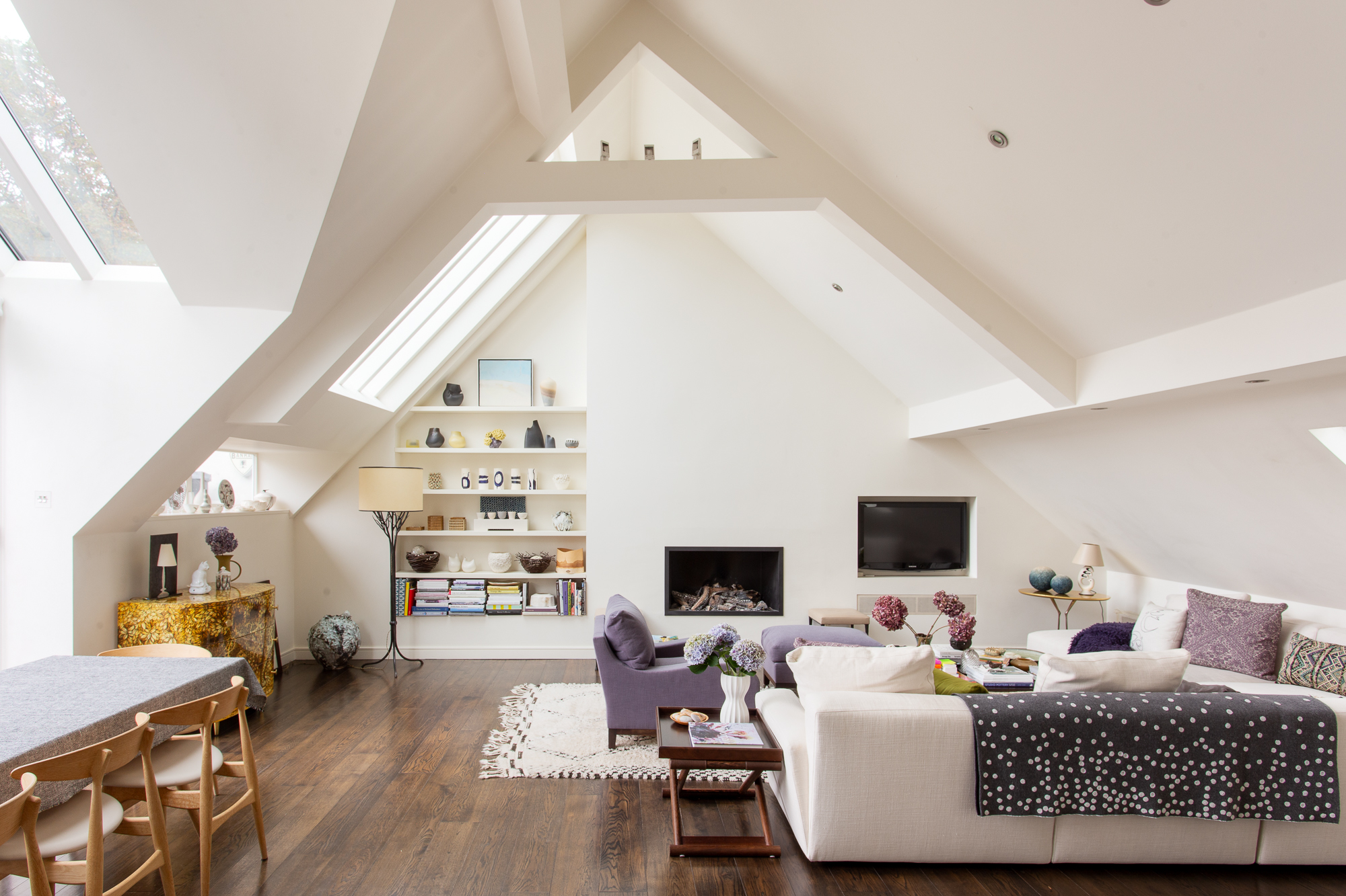 Reception room with vaulted ceiling in a three-bedroom maisonette for sale in Holland Park