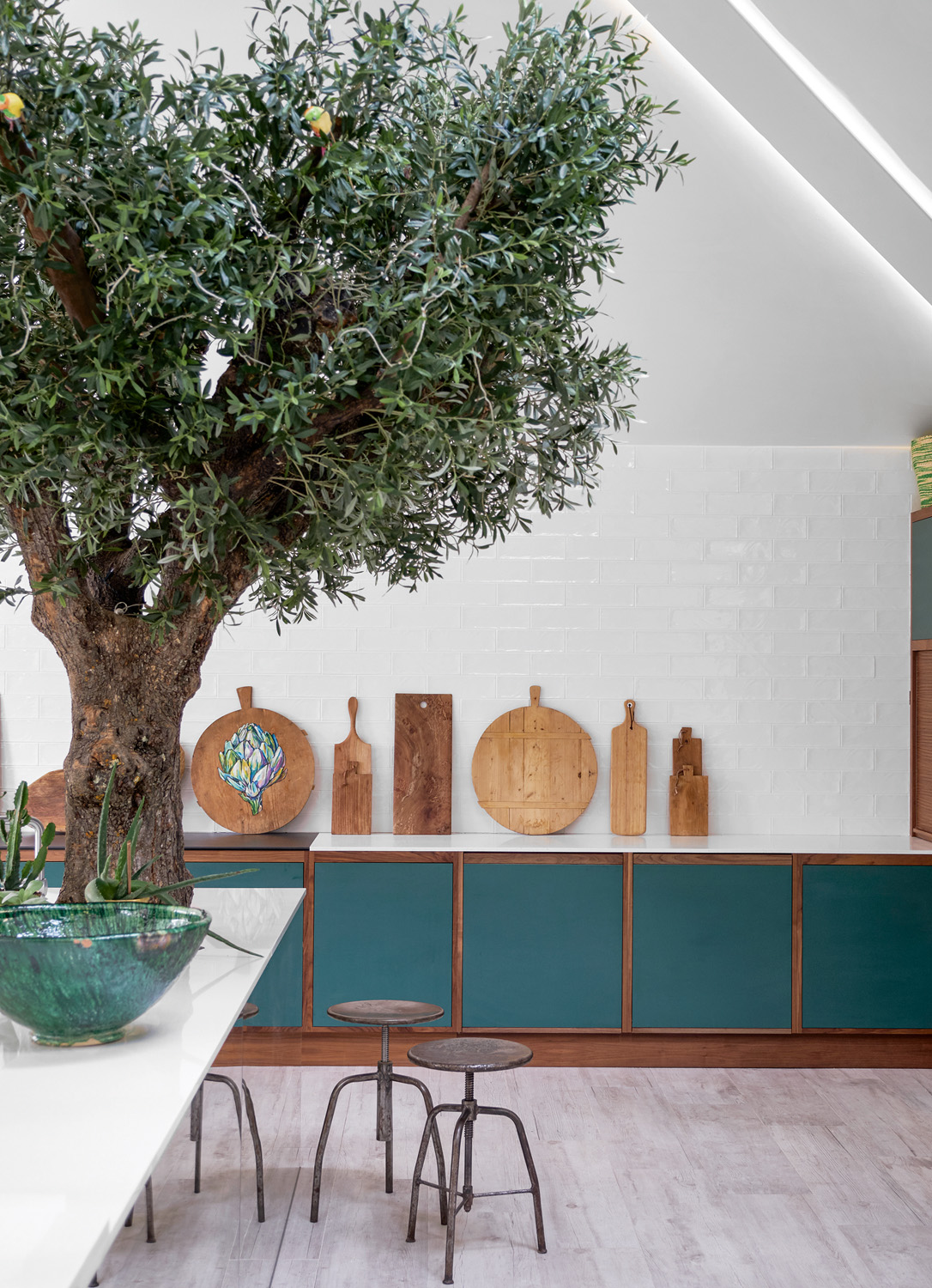 Luxury Scandinavian kitchen design in London by Sola Kitchens - modern kitchen with interior tree