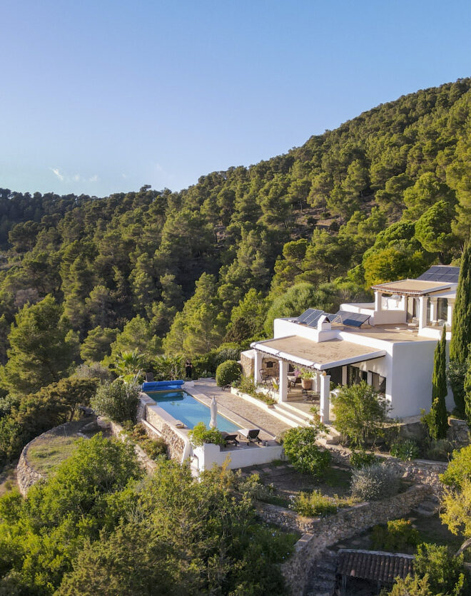 Terraced villa cascading across its mountainside plot in Ibiza