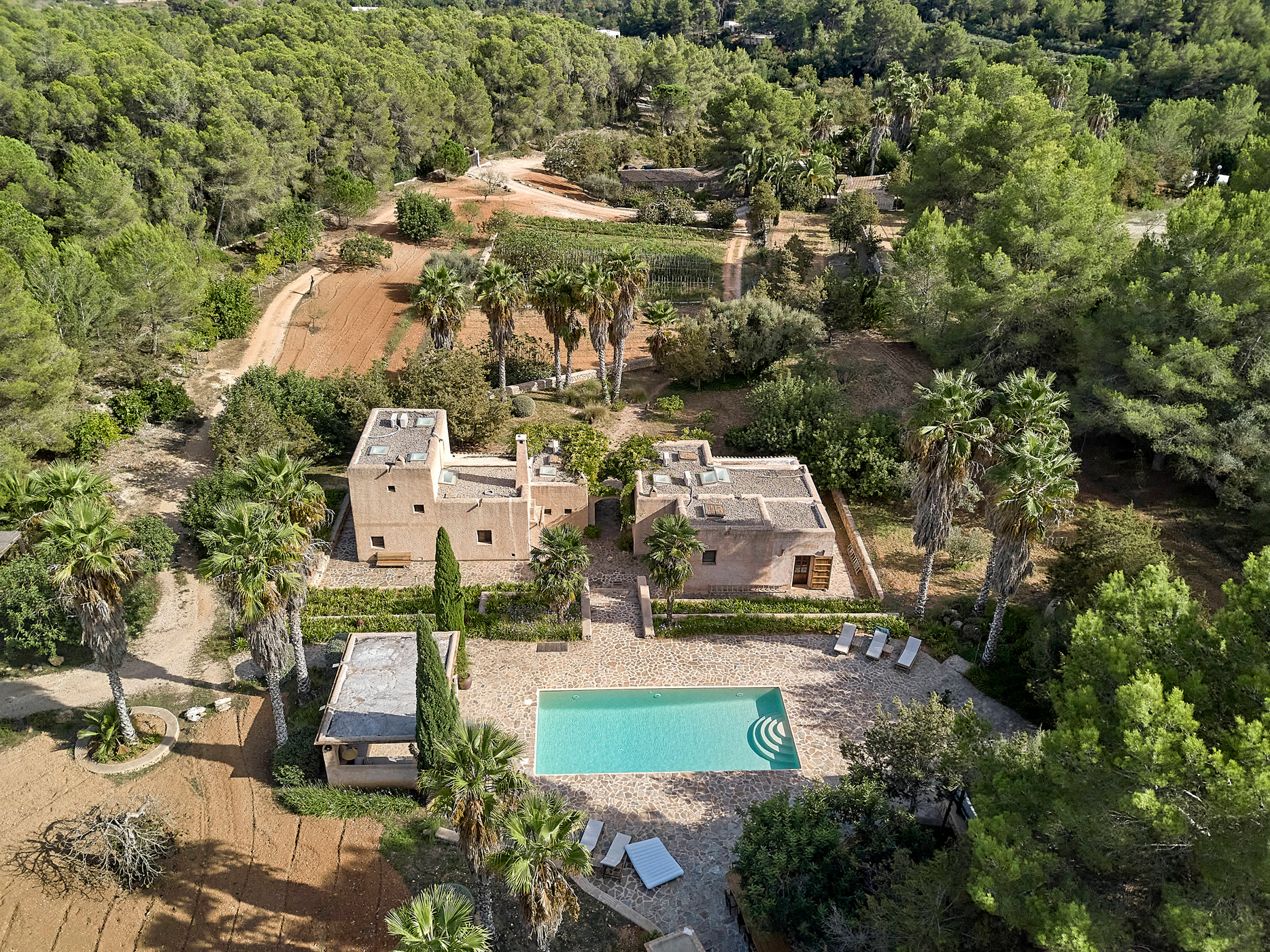 Pool and casitas of a villa for sale in northern Ibiza
