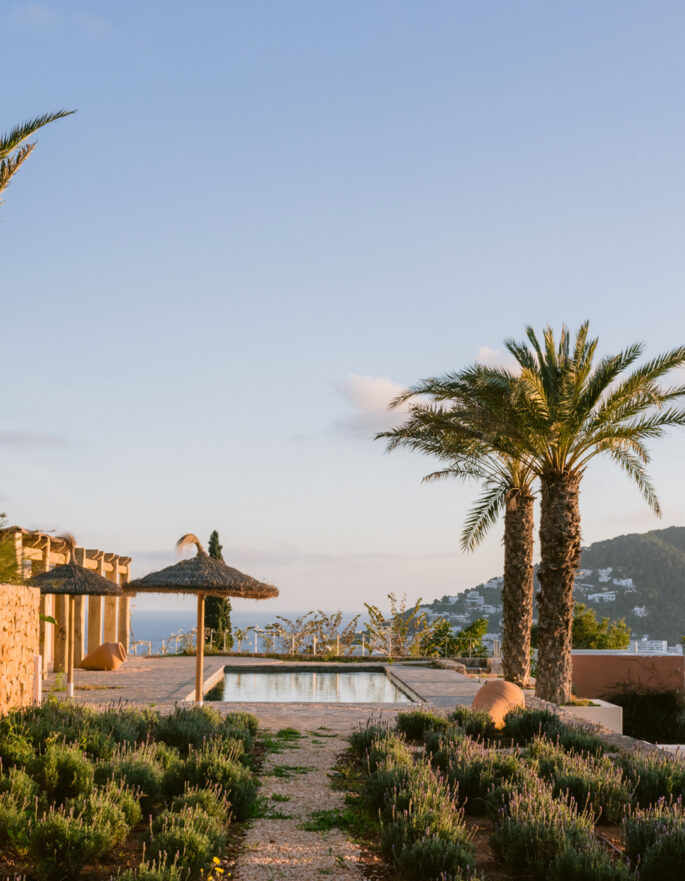 View of swimming pool and hills at Ibiza villa