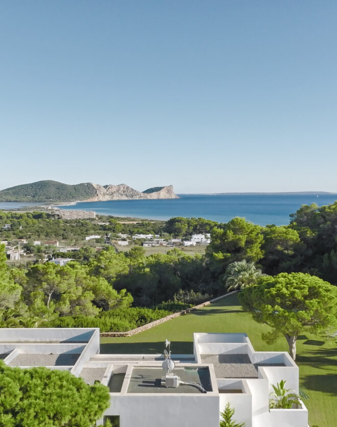 Aerial view of a stunning, sculptural luxury villa to rent in Ibiza