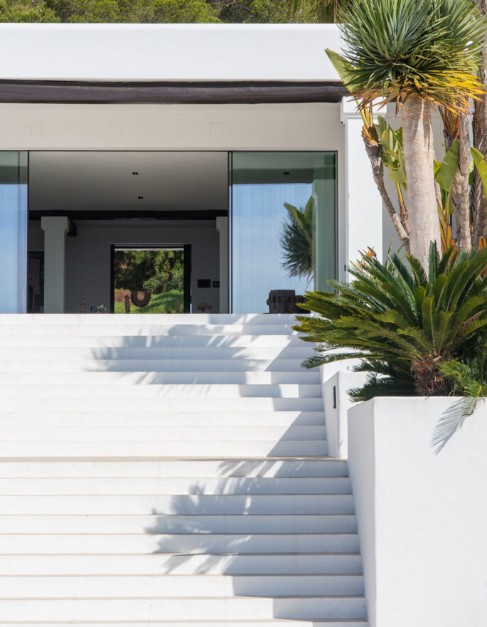 Steps leading from the pool to the house of a villa in Ibiza