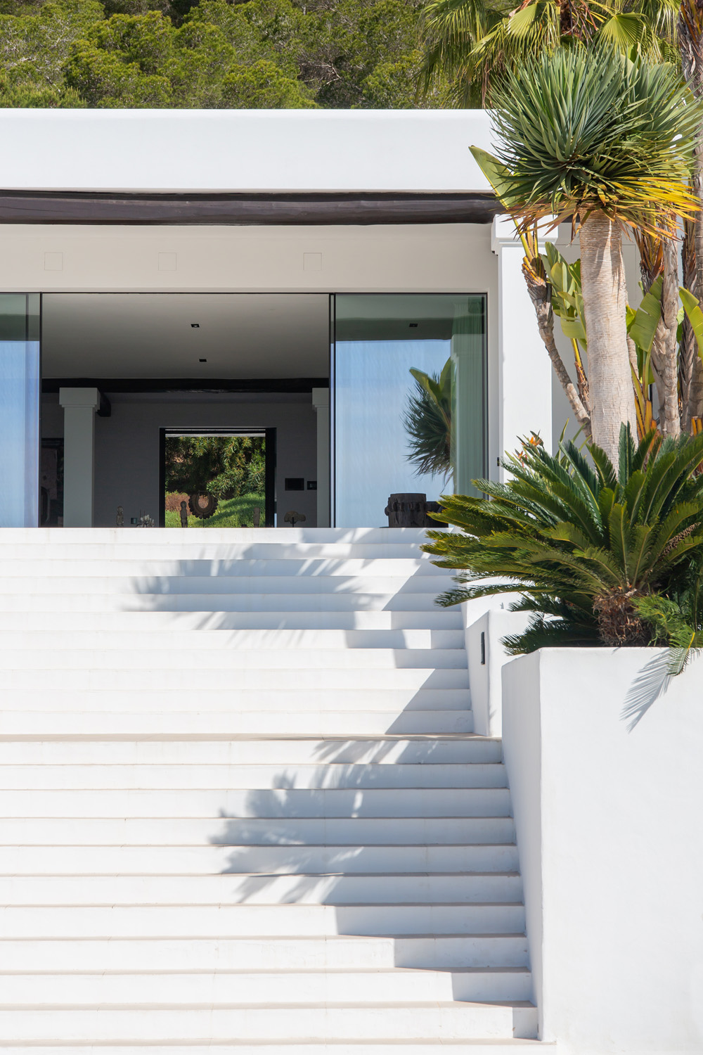 Steps leading from the pool to the house of a villa in Ibiza