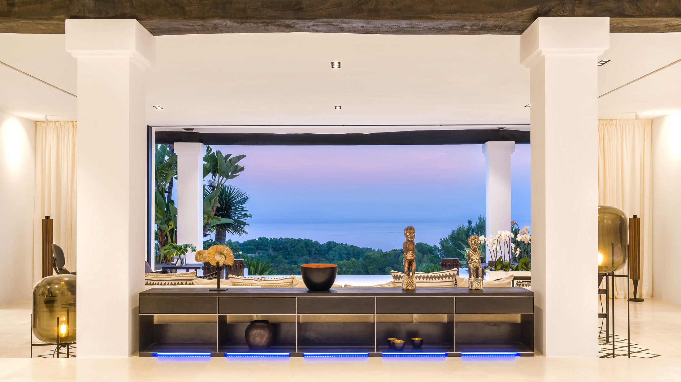 The sculptural, symmetrical interior of a luxury villa in Ibiza