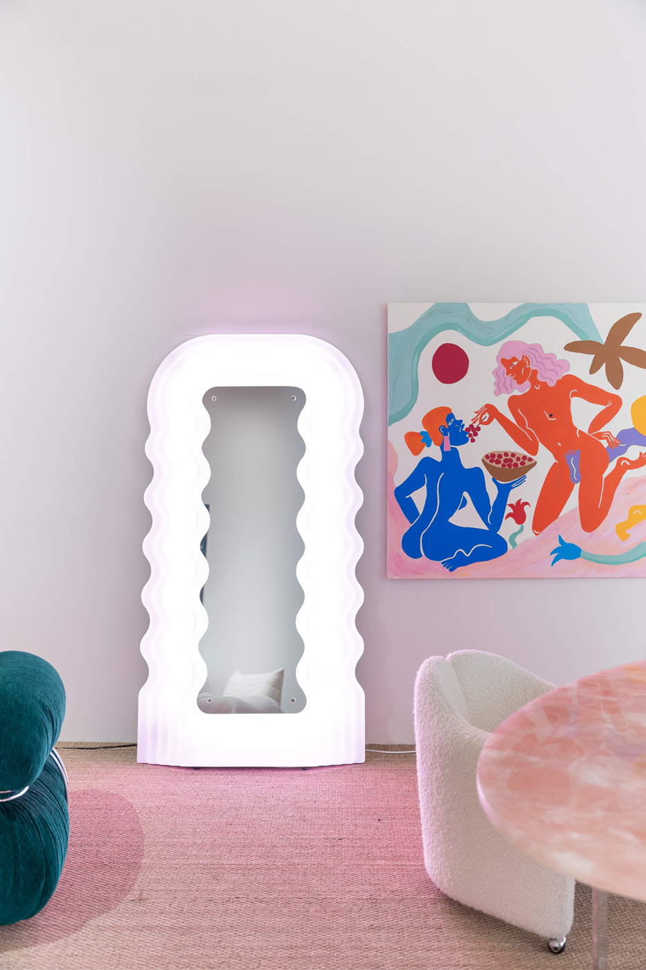 Mirror with an undulating neon frame by LA Studio, modern interior design and furniture in Ibiza