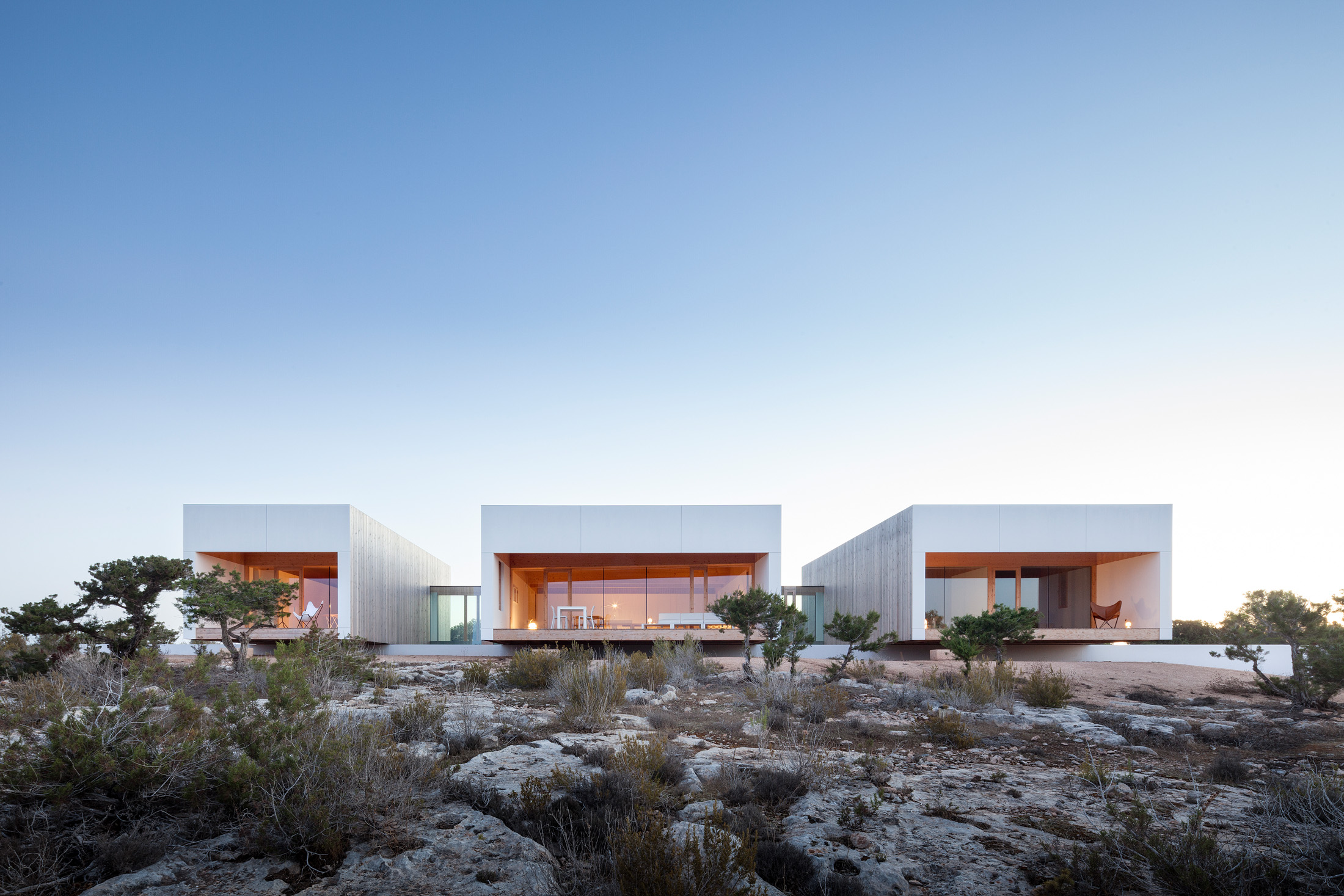 Trio of white buldings by Marià Castelló - luxury modern architecture in Ibiza and Formentera