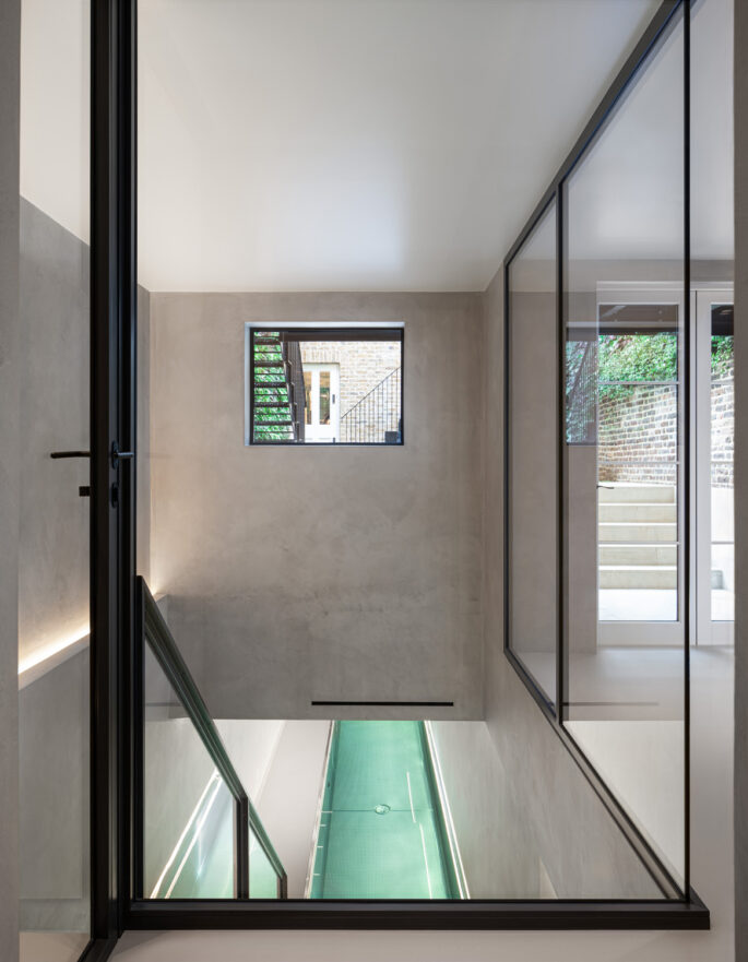 Window and swimming pool by Nash Baker