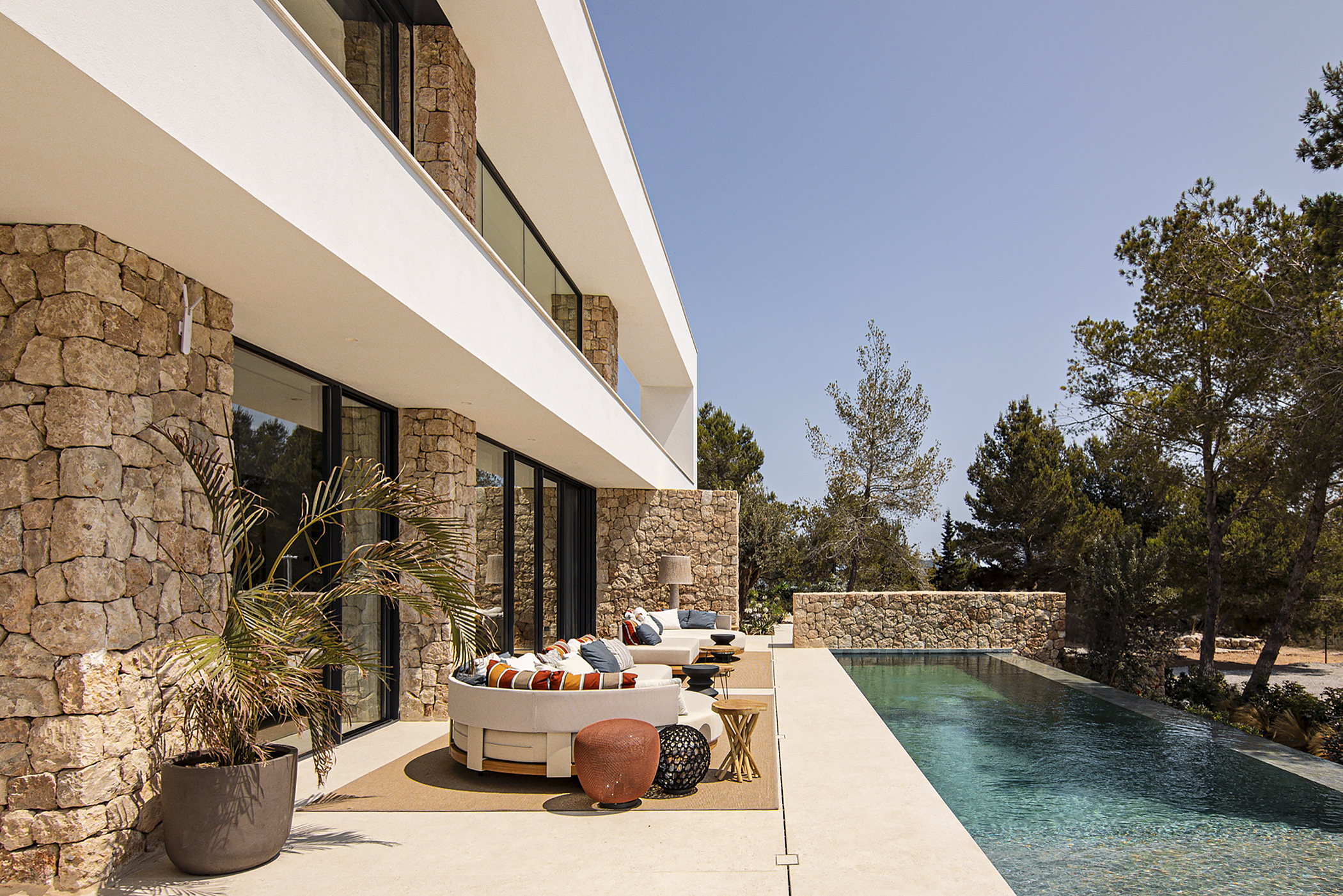 Pool area of a luxury new build villa in Ibiza
