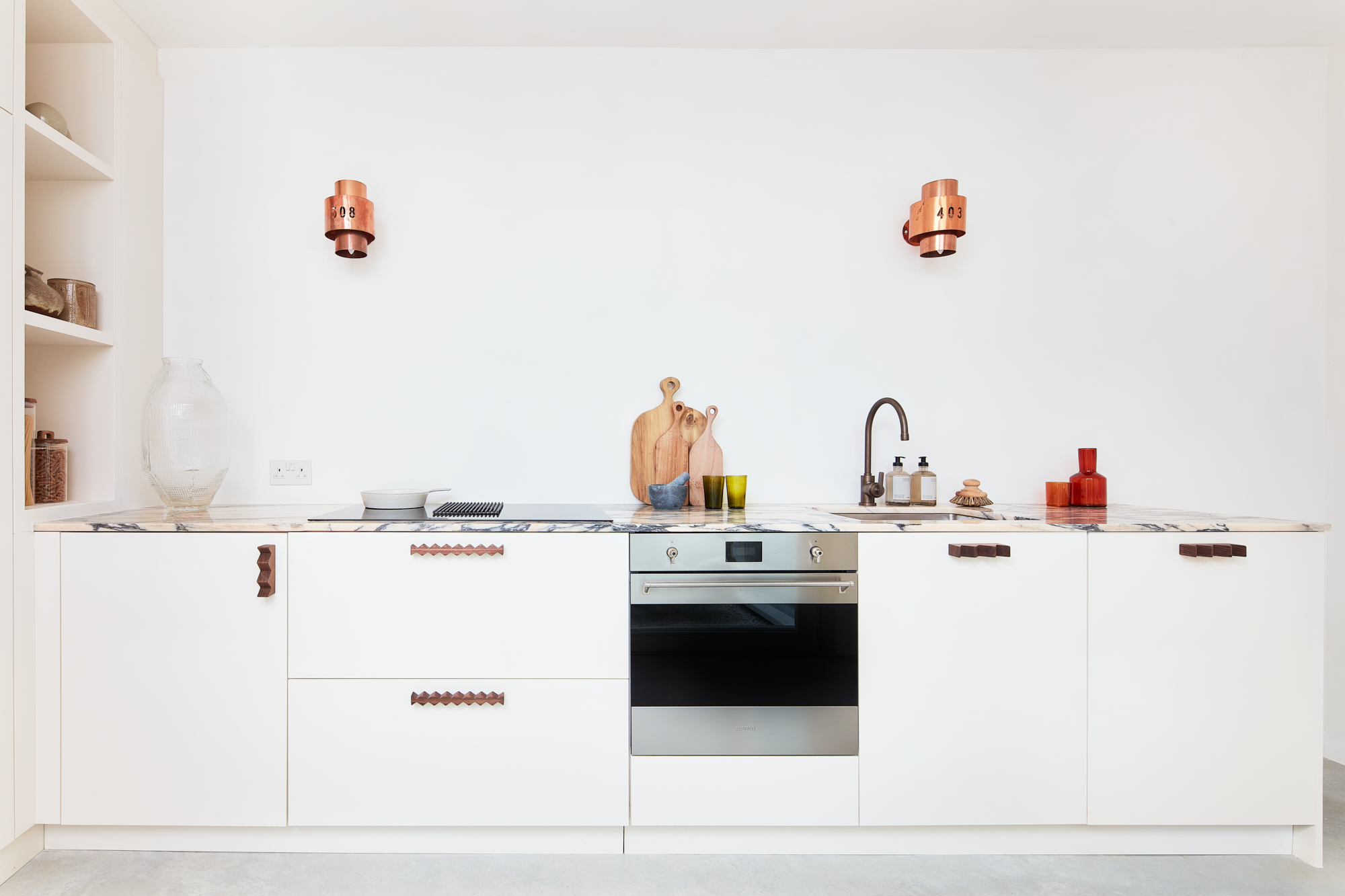 Modern kitchen of a luxury two-bedroom apartment for sale in North Kensington