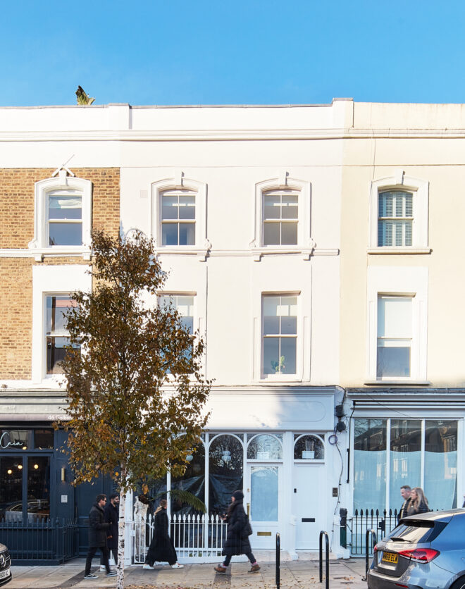 Pastel exterior of a luxury two-bedroom apartment for sale on Golborne Road in North Kensington