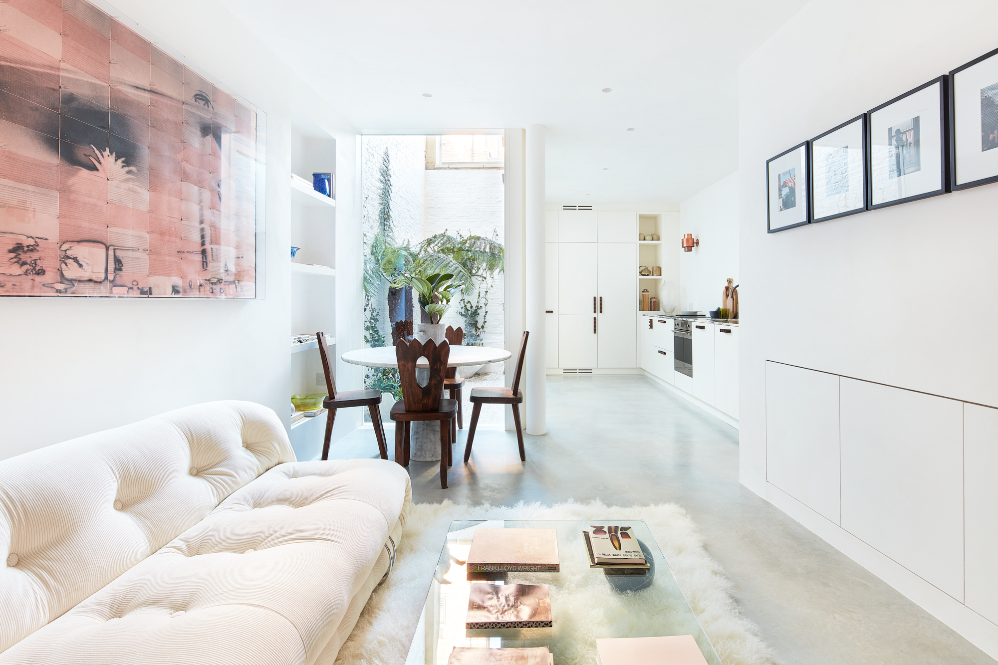 Minimalist open-plan living room of an apartment for sale in North Kensington