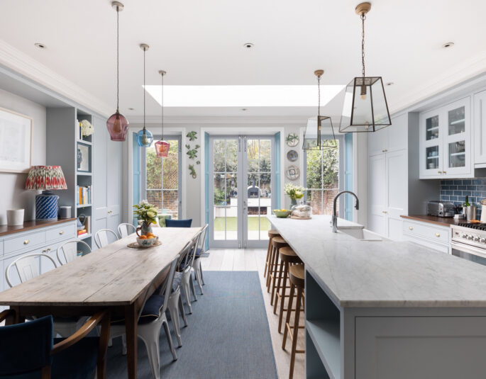 For Sale: Highlever Road North Kensington W10 open-plan kitchen and dining room with blue joinery and skylights