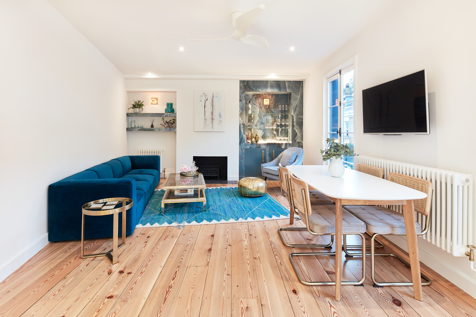 Spacious open-plan living and dining room of a luxury Notting Hill mews home for rent
