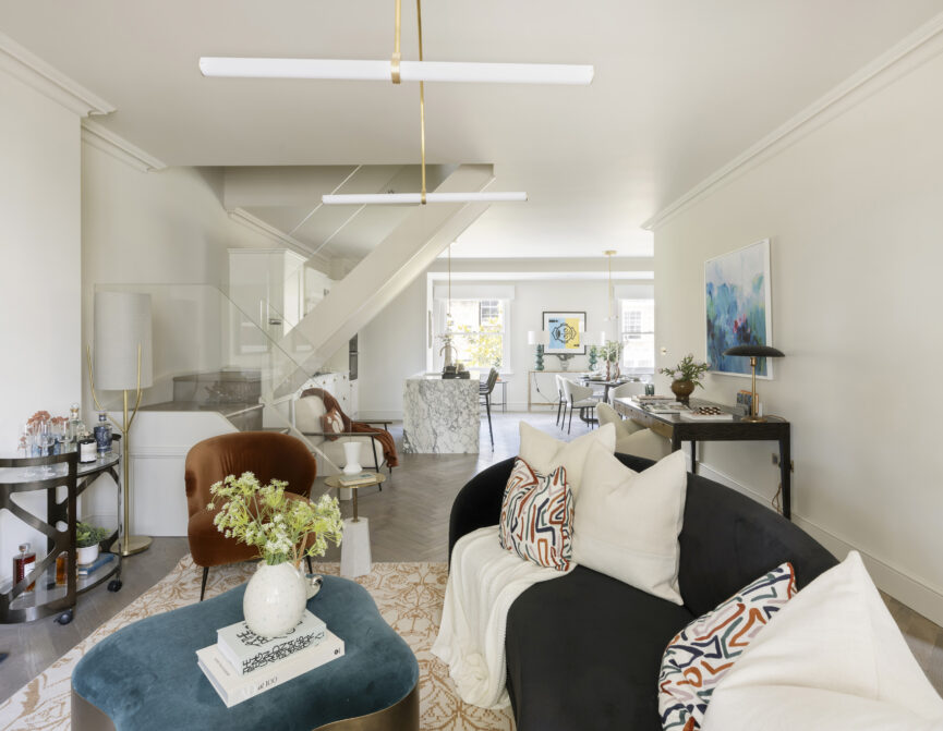 Luxury design-led reception room with herringbone floors in a three-bedroom duplex apartment for sale in Notting Hill