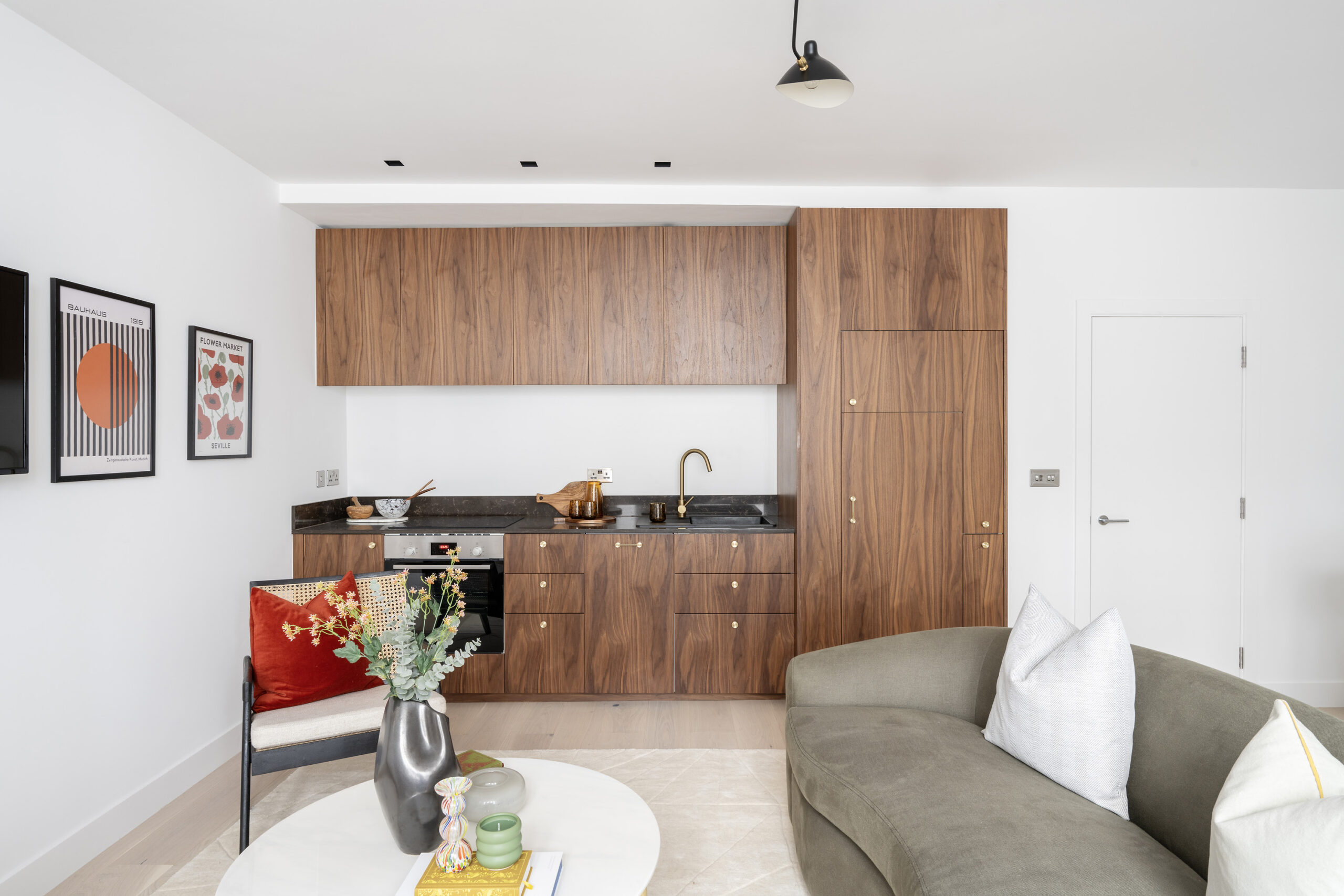 Contemporary open-plan kitchen of a luxury two-bedroom maisonette for sale