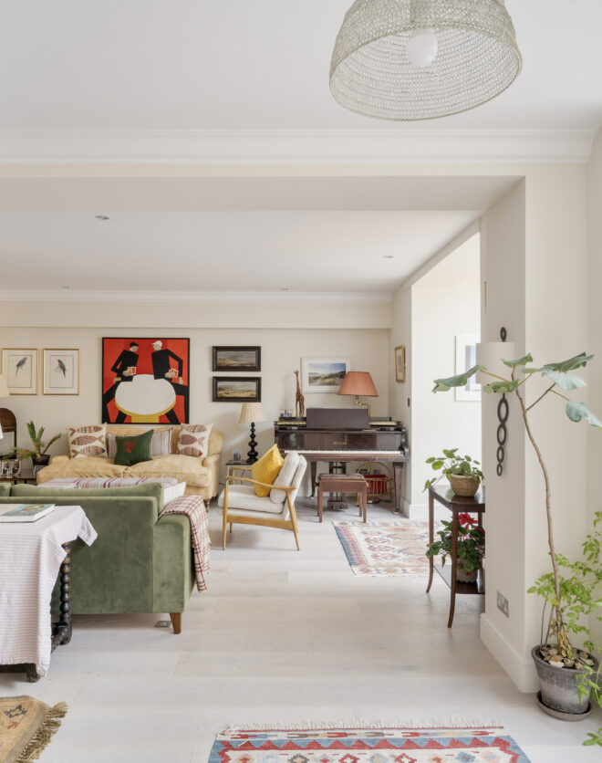 Modern reception room of a three-bedroom garden apartment for sale in North Kensington