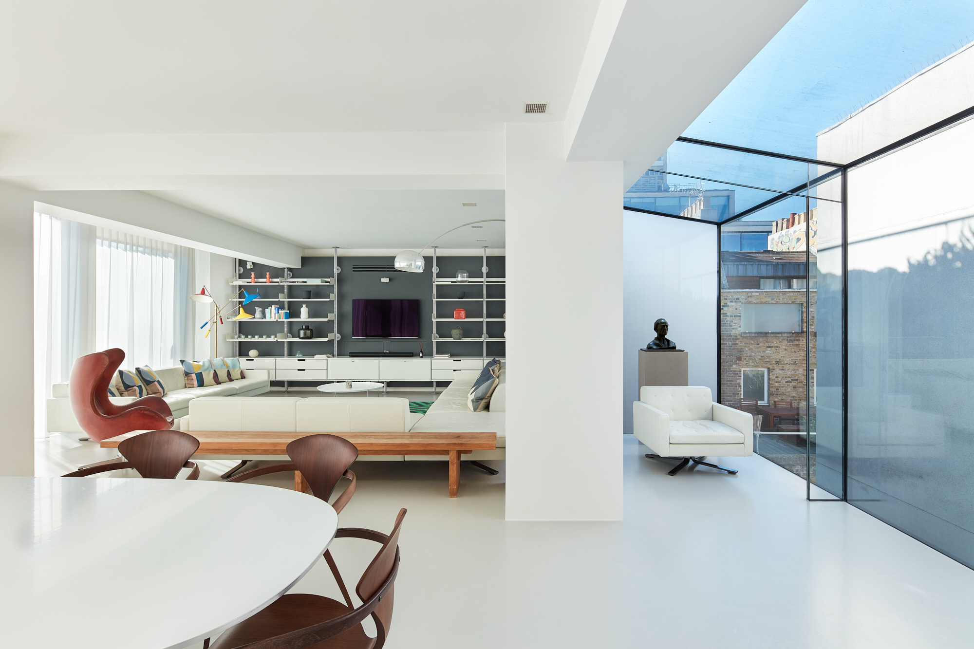 Architect-designed minimalist living room of a four-bedroom triplex for sale in Notting Hill