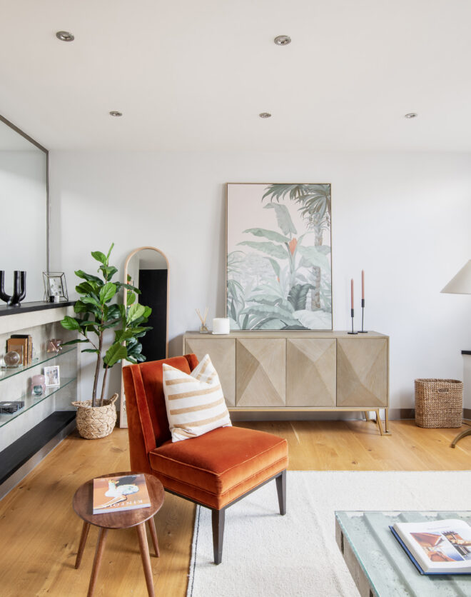 Industrial inspired living room of a two-bedroom home for sale on Portobello Road