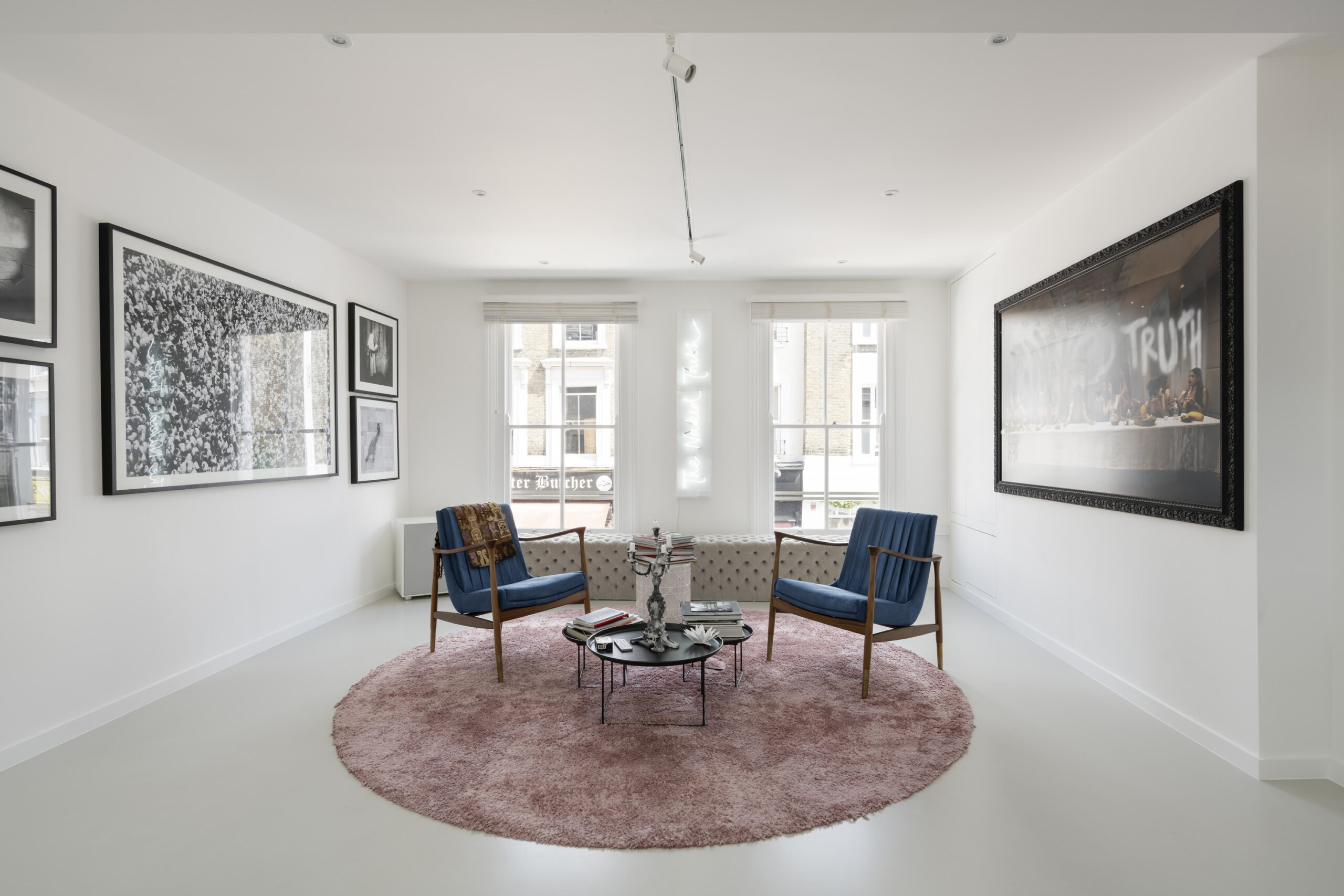 Bright minimalist reception room of a luxury two-bedroom maisonette for sale on Portobello Road