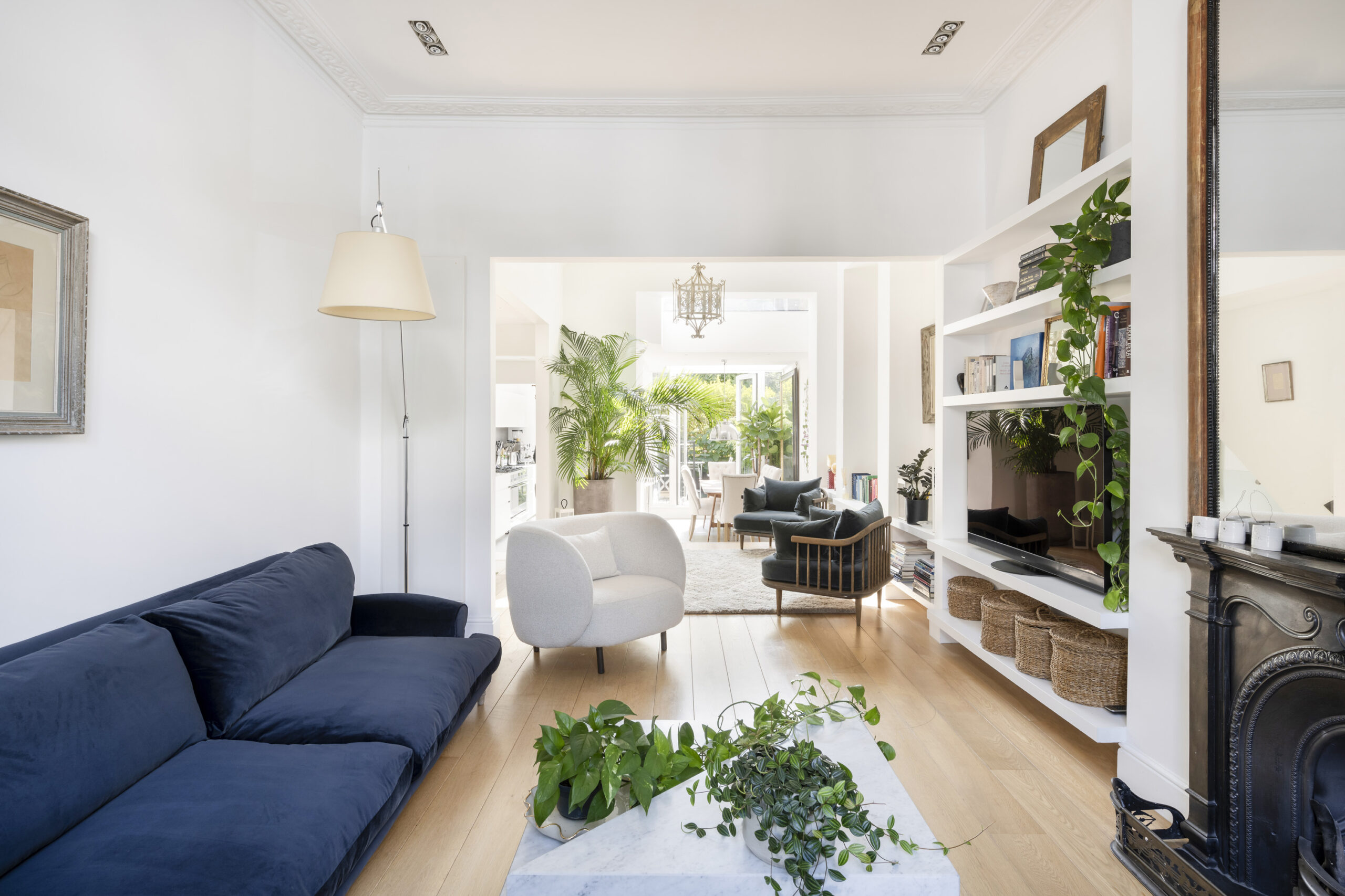 Stylish open-plan reception room of a luxury two-bedroom maisonette for sale in Notting Hill