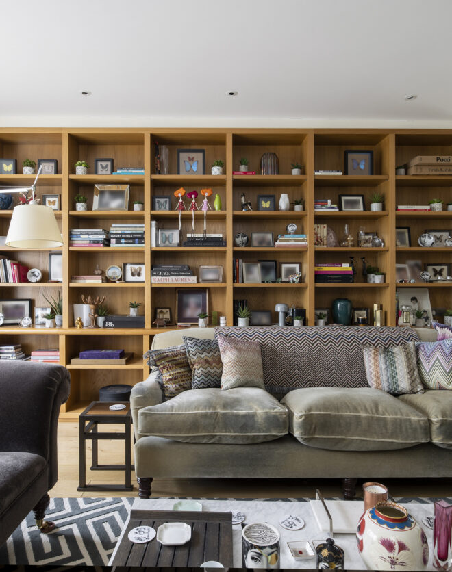 For Rent, Horbury Mews Notting Hill W11 wooden bookcases with books and grey sofa
