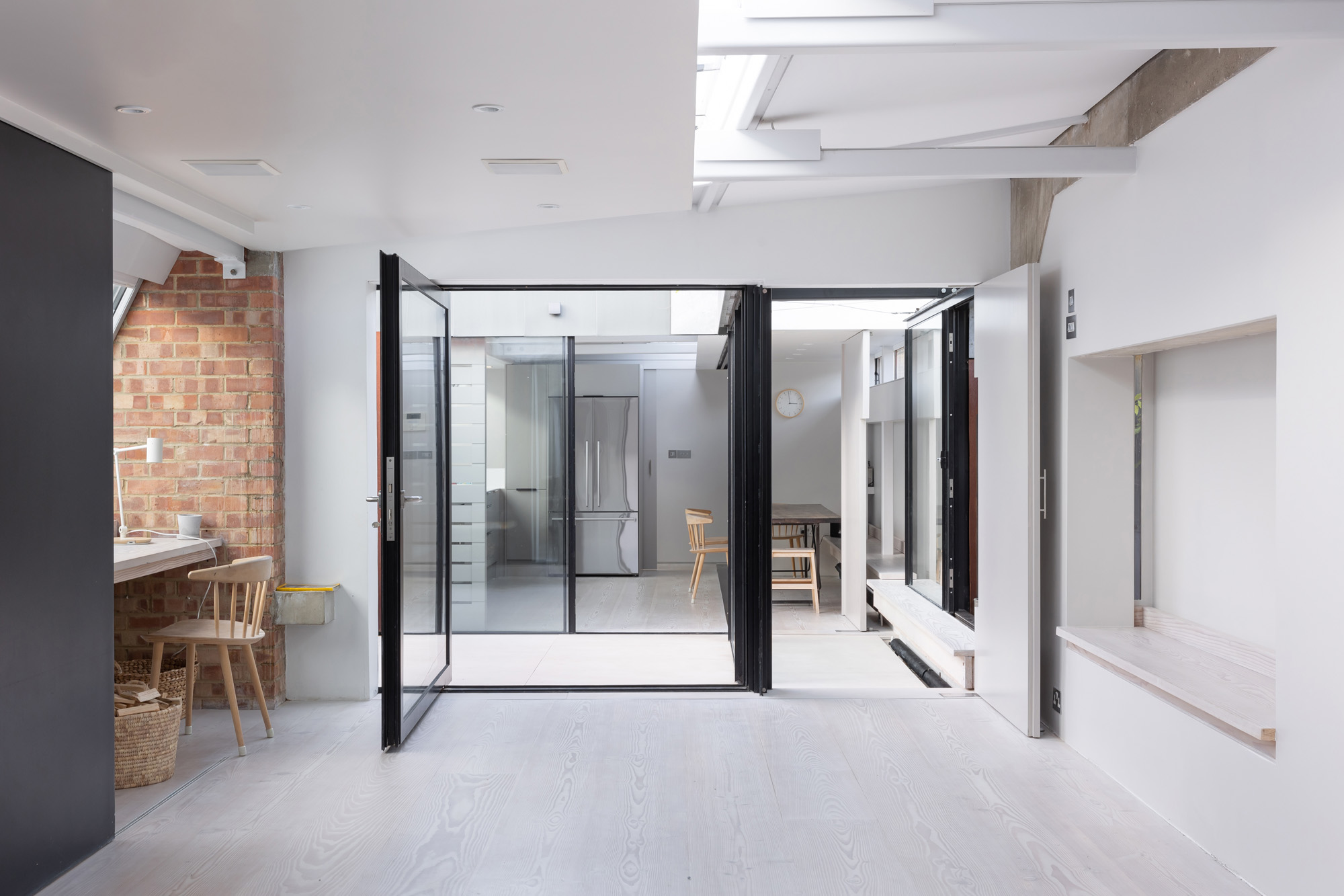 For Rent: Vernon Yard Notting Hill W11 - contemporary architecture with folding glass doors and brick walls