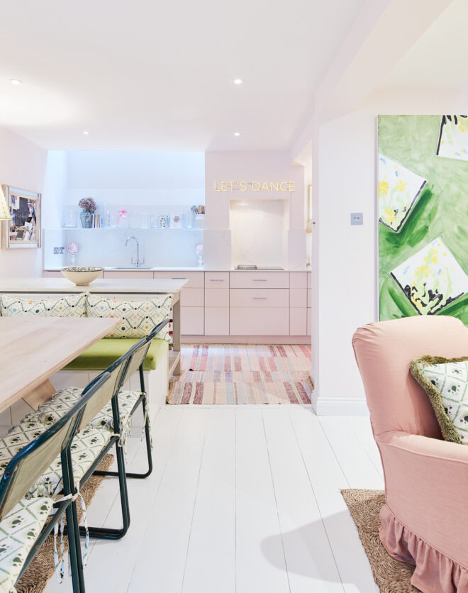 For Sale, Hippodrome Mews Holland Park W11 living and dining room with pink walls and colourful furniture