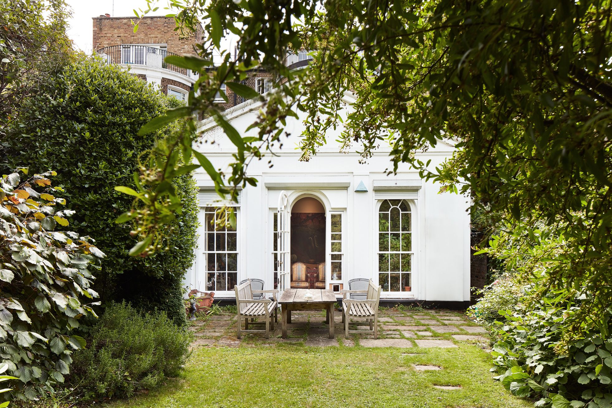 Spacious leafy garden of a grand townhouse for sale in Notting Hill