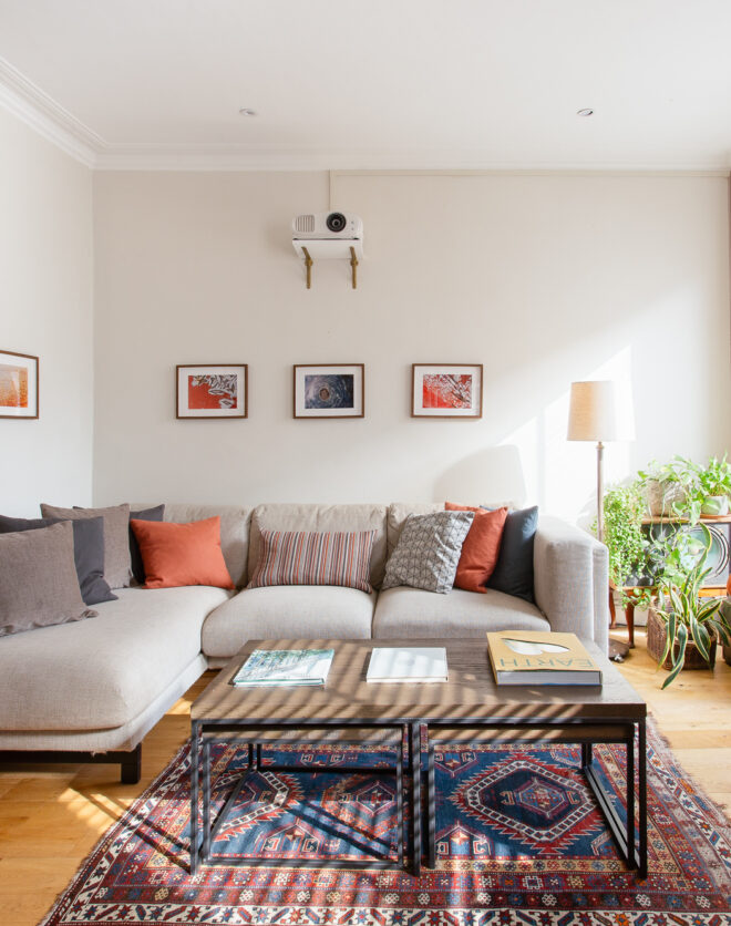 Rustic-style open-plan living room of a maisonette for sale in Notting Hill