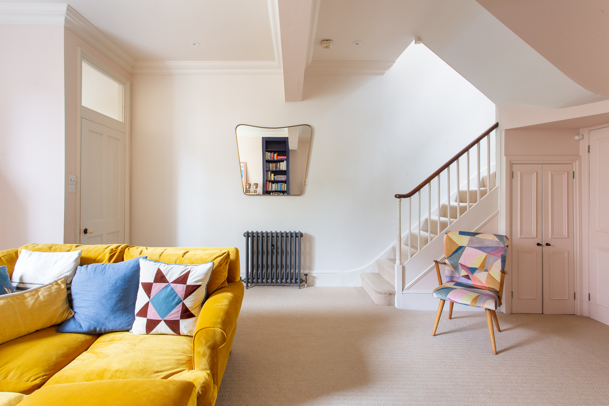Luxurious bright reception room of a charming cottage style house for sale on Portobello Road