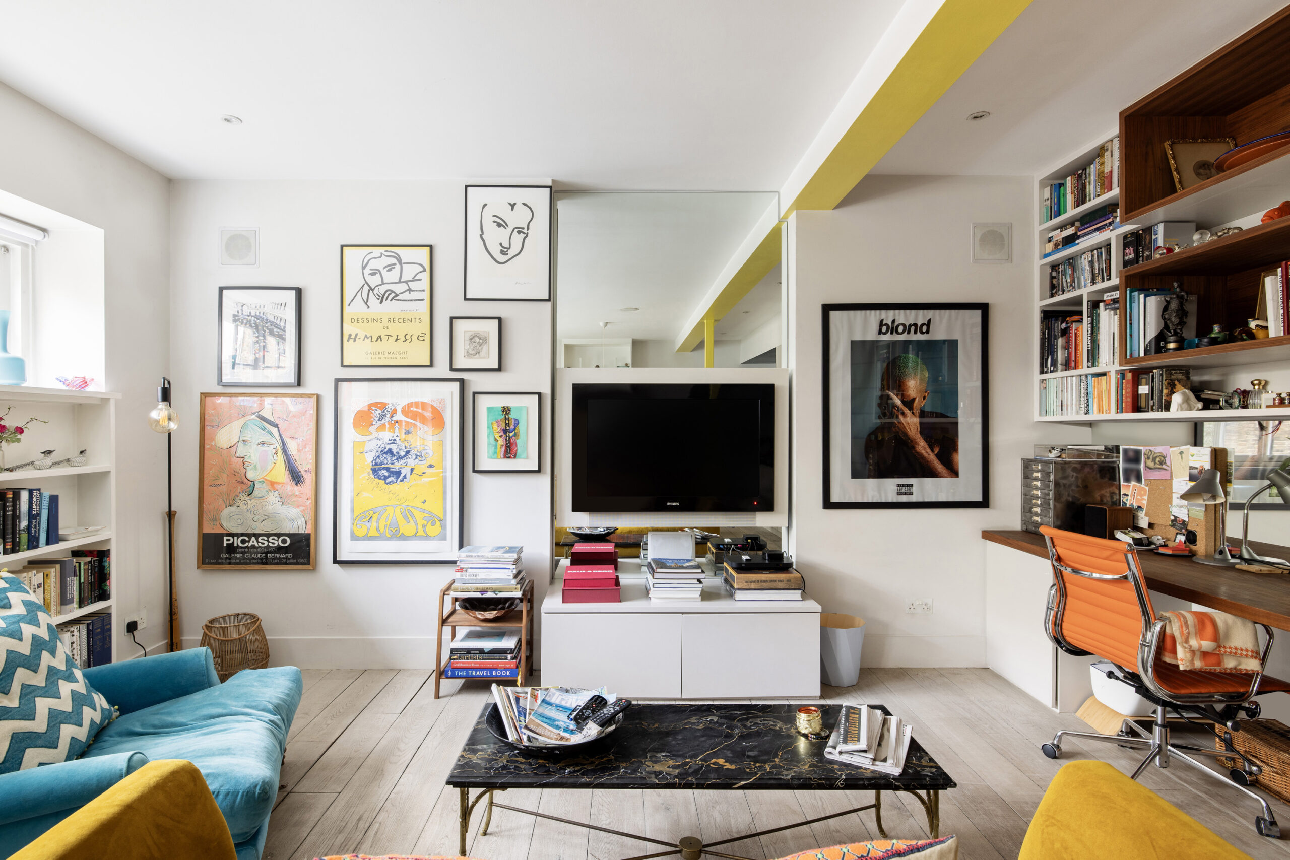 Brightly designed reception room of a luxury two-bedroom mews house for sale in Notting Hill
