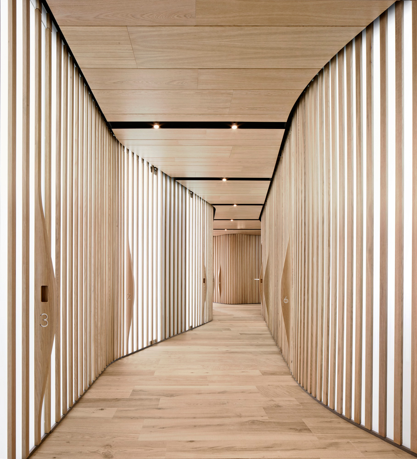Corridor with wooden beams by OHLAB - luxury contemporary architecture and interior design studio in Ibiza