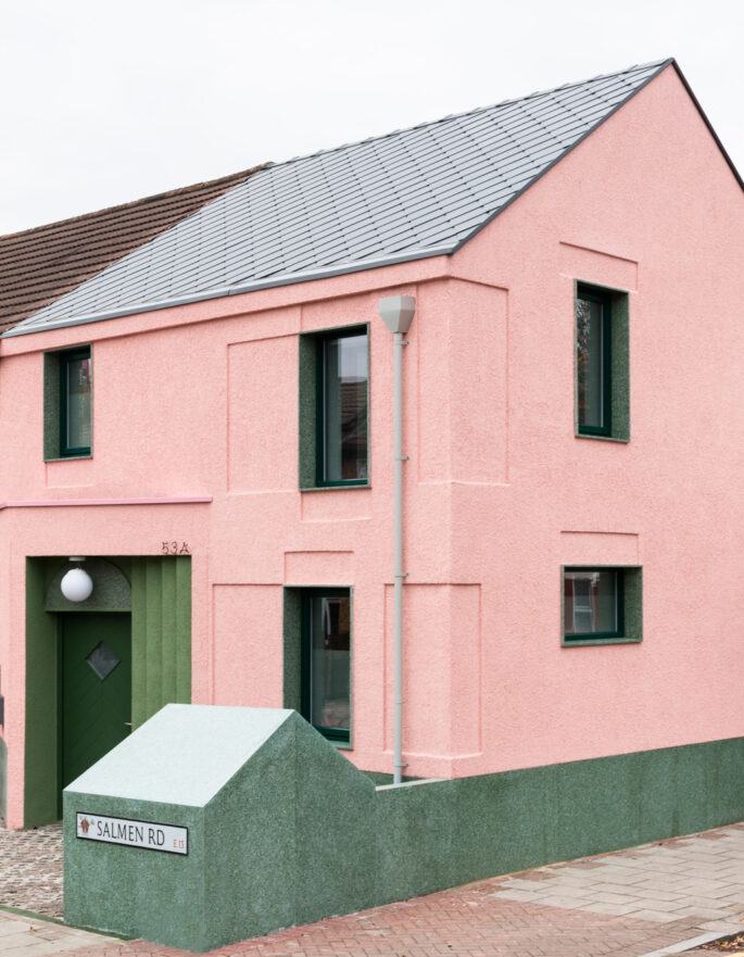 Pink and green house by Office S&M