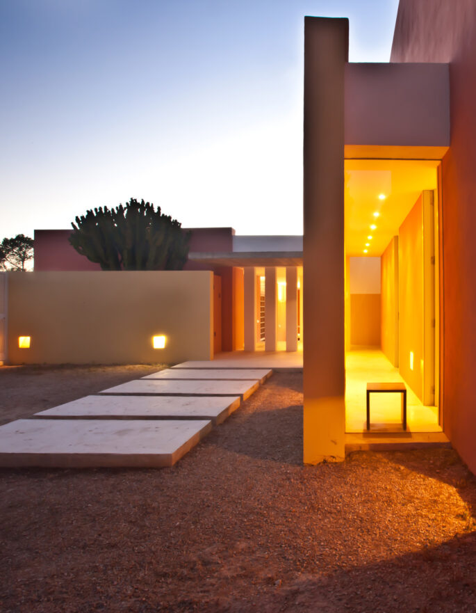 Exterior with evening lighting by Pep Torres - contemporary architecture and design studio in Ibiza