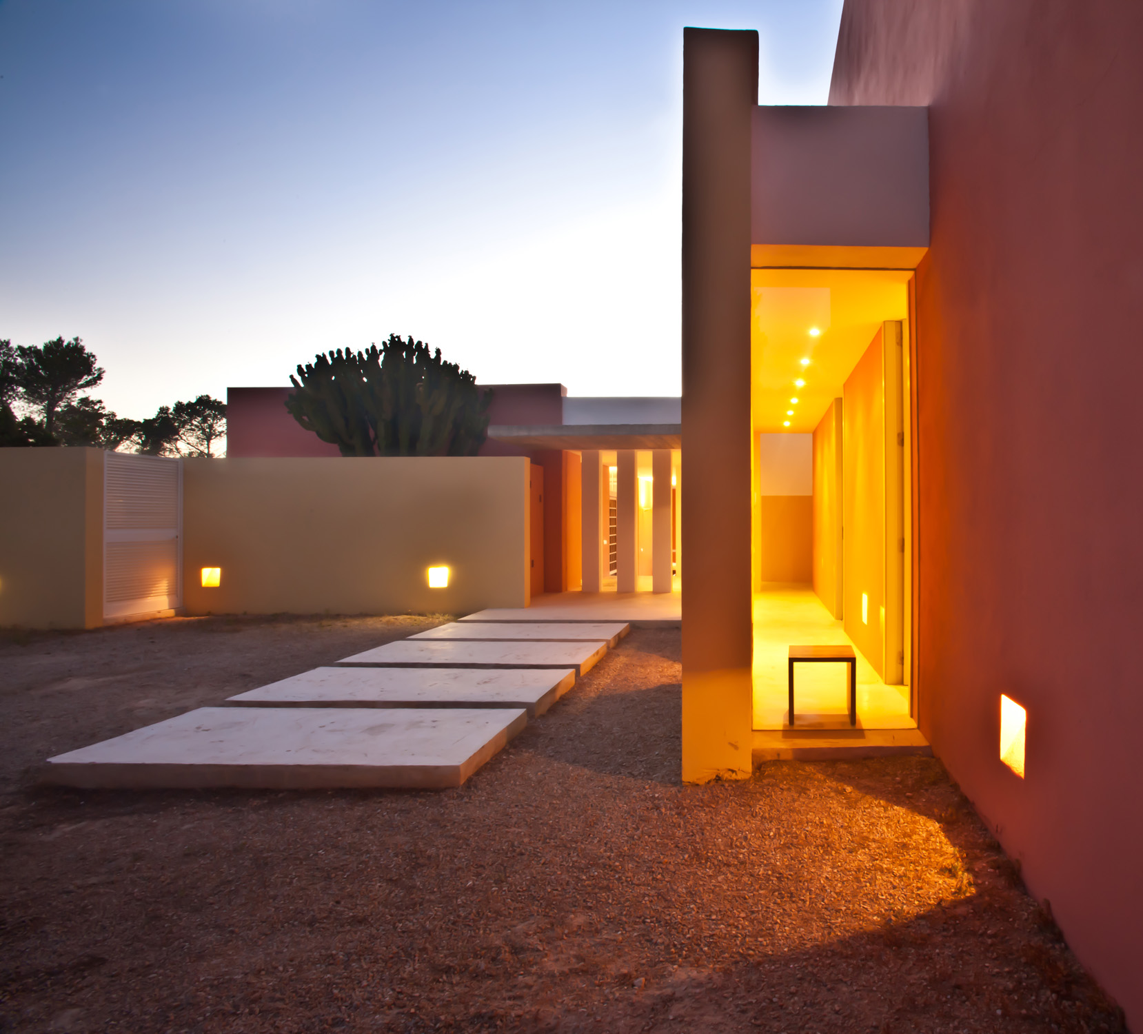 Exterior with evening lighting by Pep Torres - contemporary architecture and design studio in Ibiza