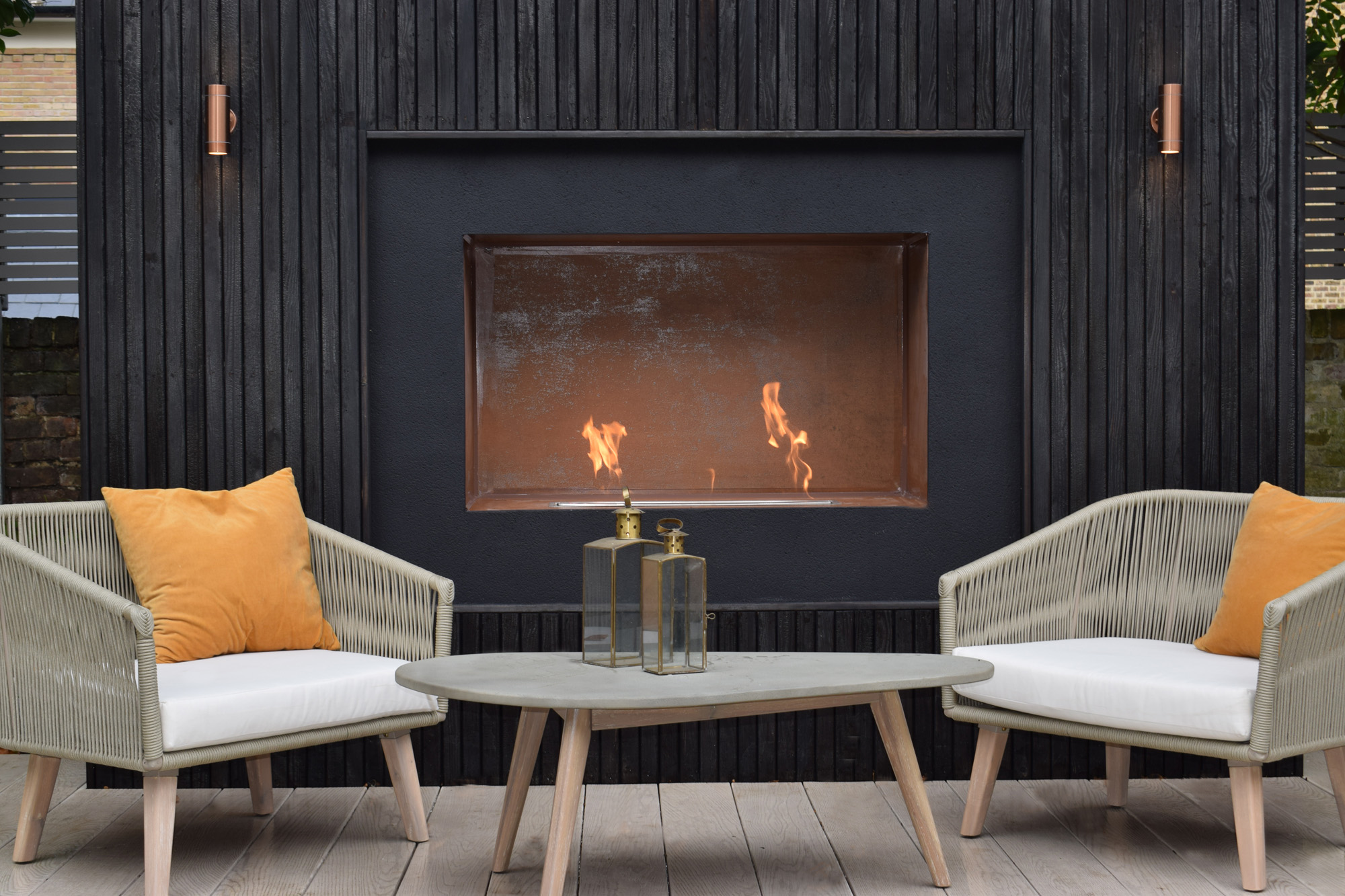 Fireplace by Pollyanna Wilkinson - contemporary landscape and garden design in London