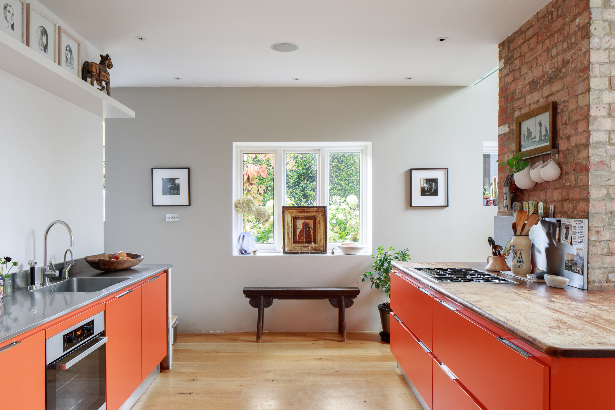 Wrentham Avenue NW10 to rent, contemporary kitchen with orange cabinets