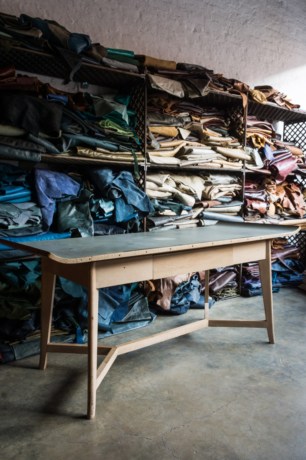 Leather workshop by Retrouvius - salvage and upcycling interior design studio in London