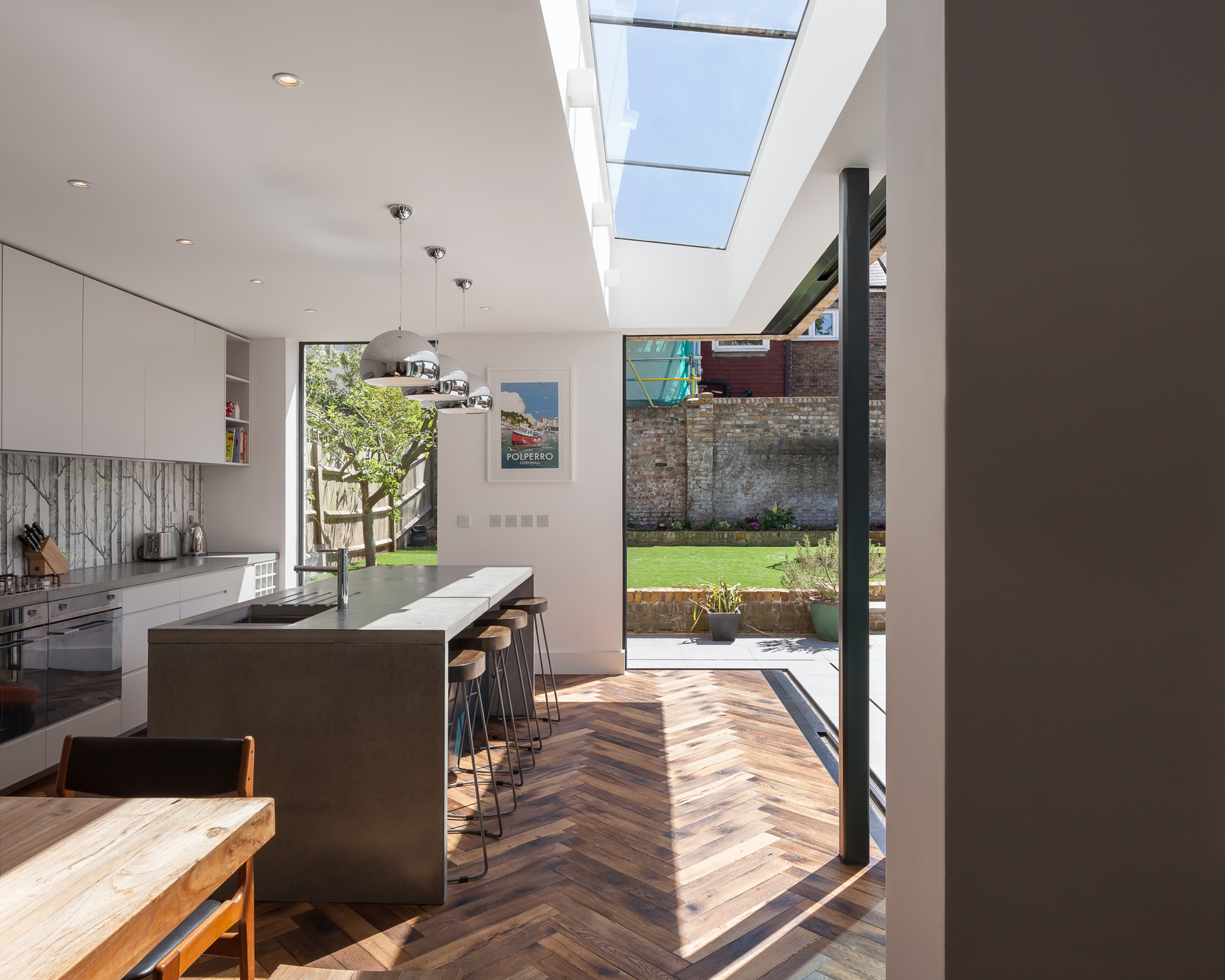 Dining table and skylight by Russian For Fish - contemporary architecture studio in London