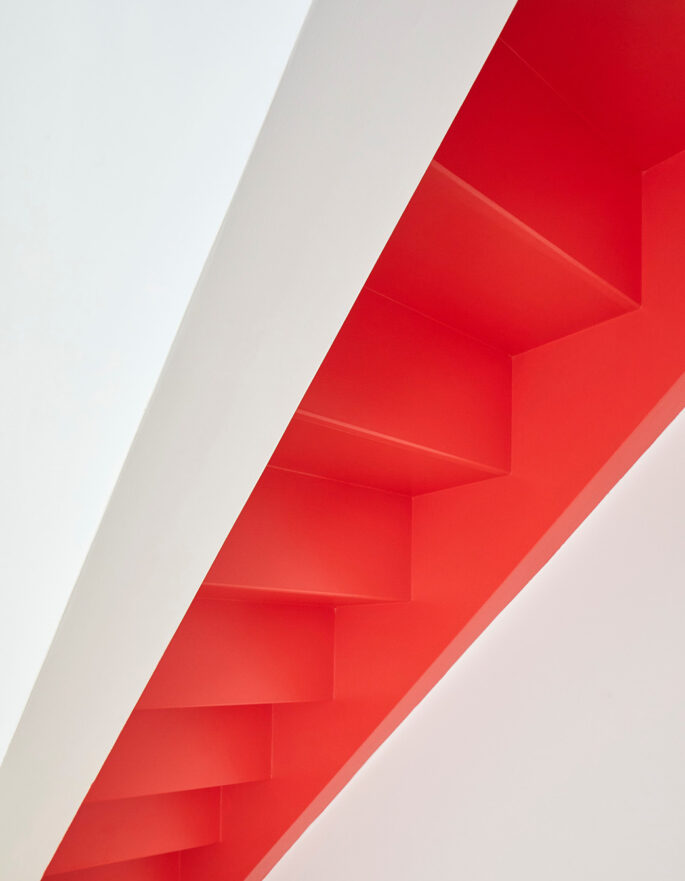 Red staircase by Sophie Nguyen