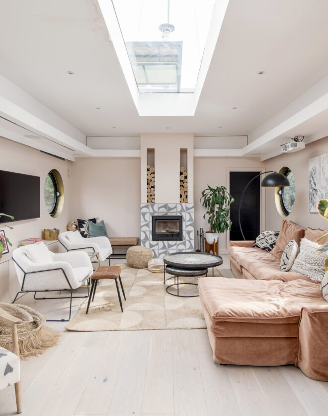 Luxury pastel coloured open-plan interiors of a house boat for sale