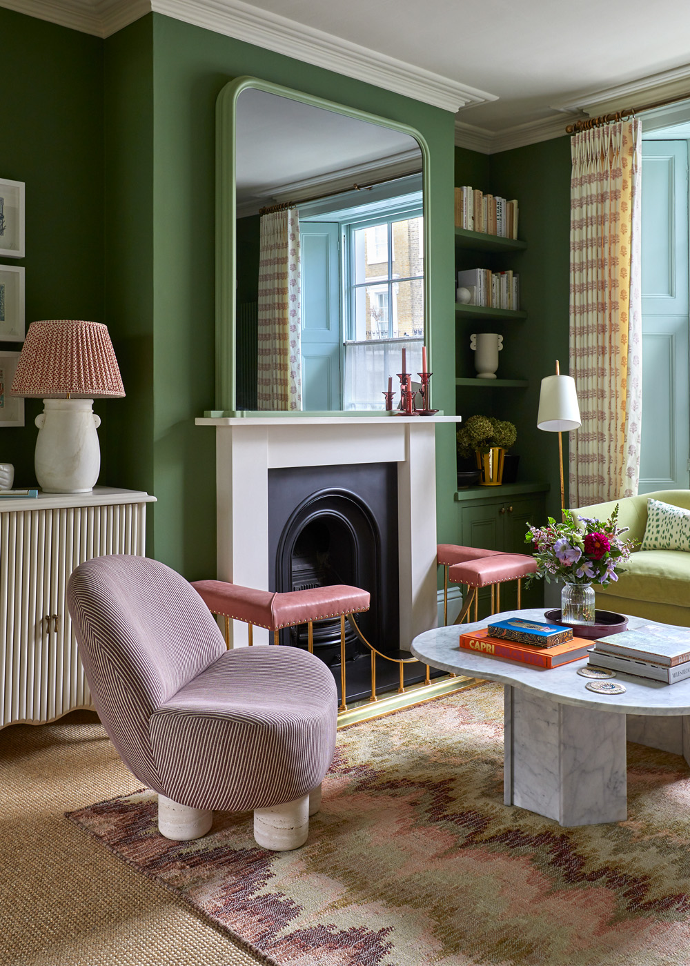 Fireplace in a green-painted living room