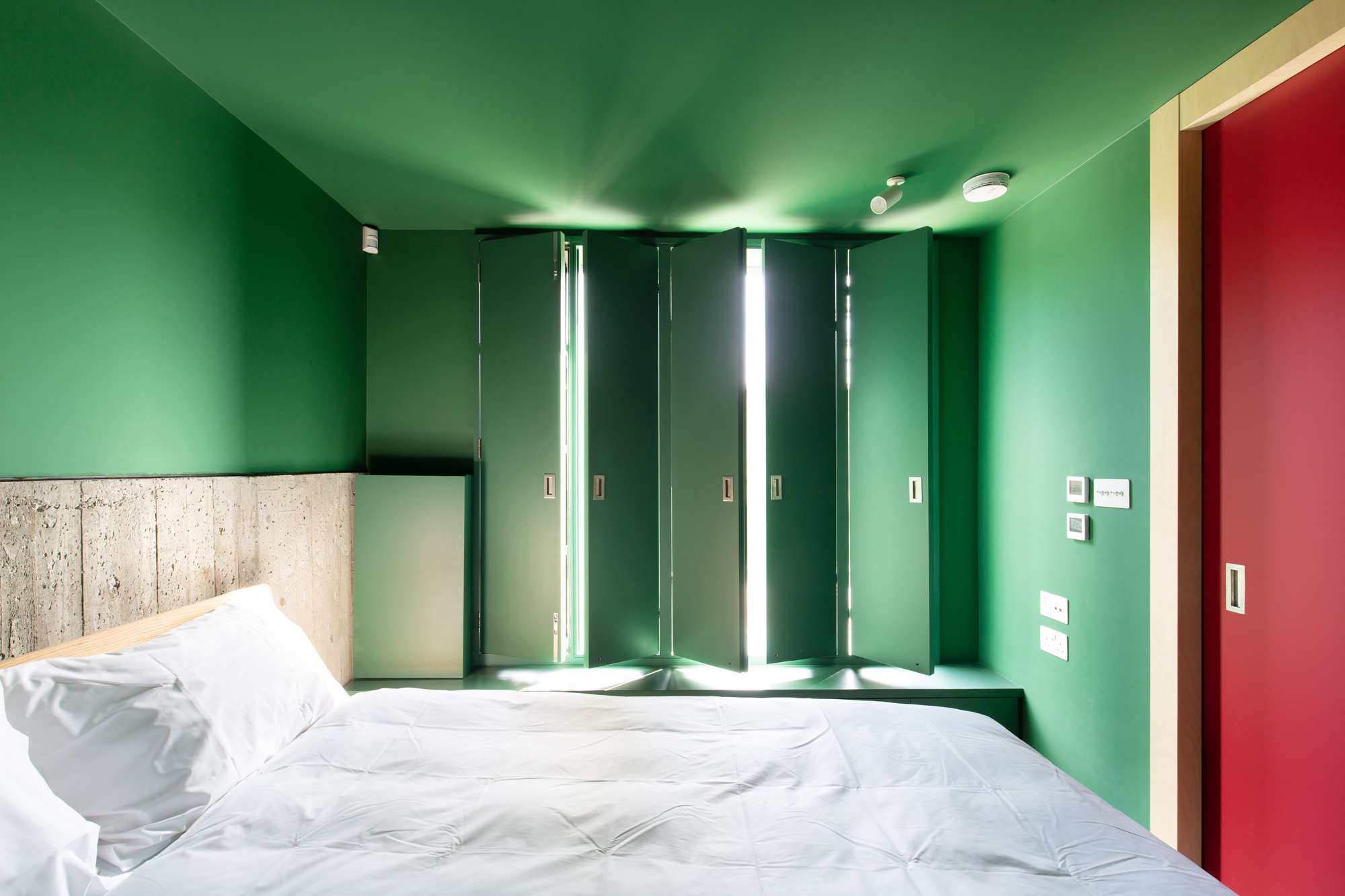 Green bedroom by Teatum + Teatum